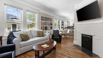 Smart TV, fireplace, books