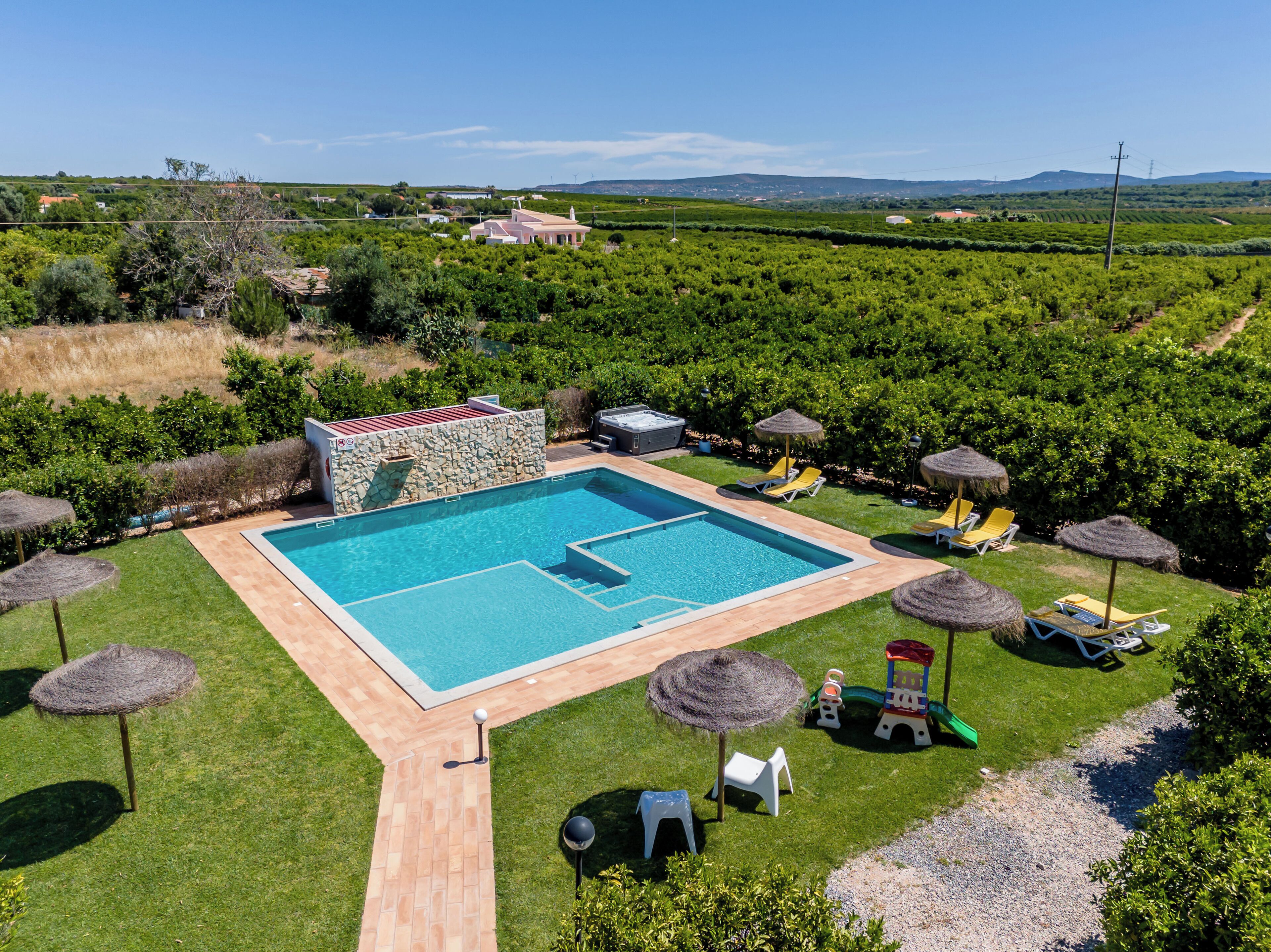 Outdoor pool, pool umbrellas, pool loungers