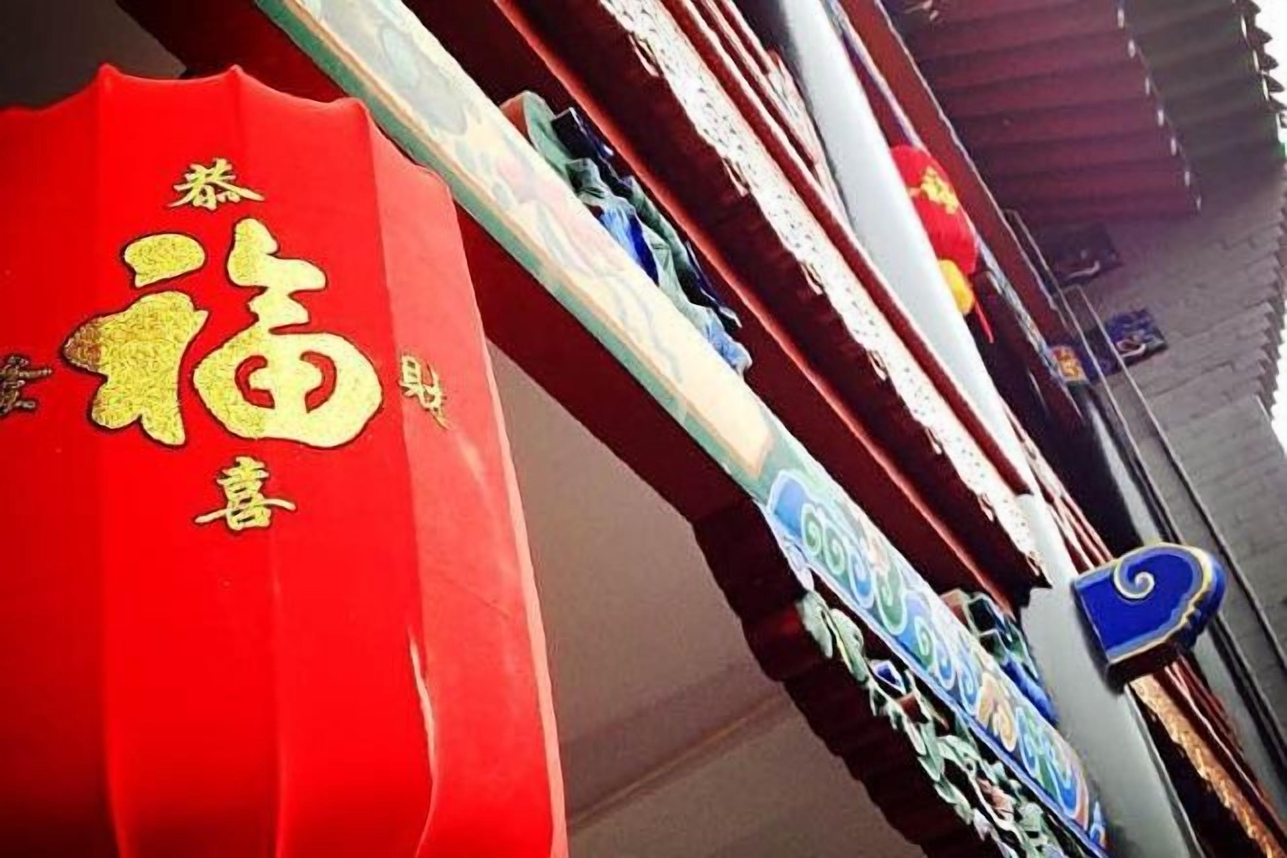 A row of red and white signs with Chinese characters, likely indicating a business or establishment.
