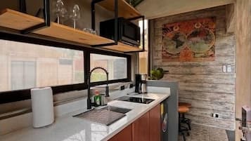 Fridge, microwave, stovetop, coffee/tea maker