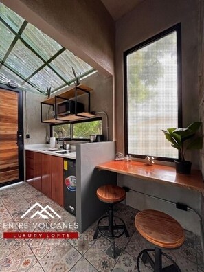 Fridge, microwave, stovetop, coffee/tea maker