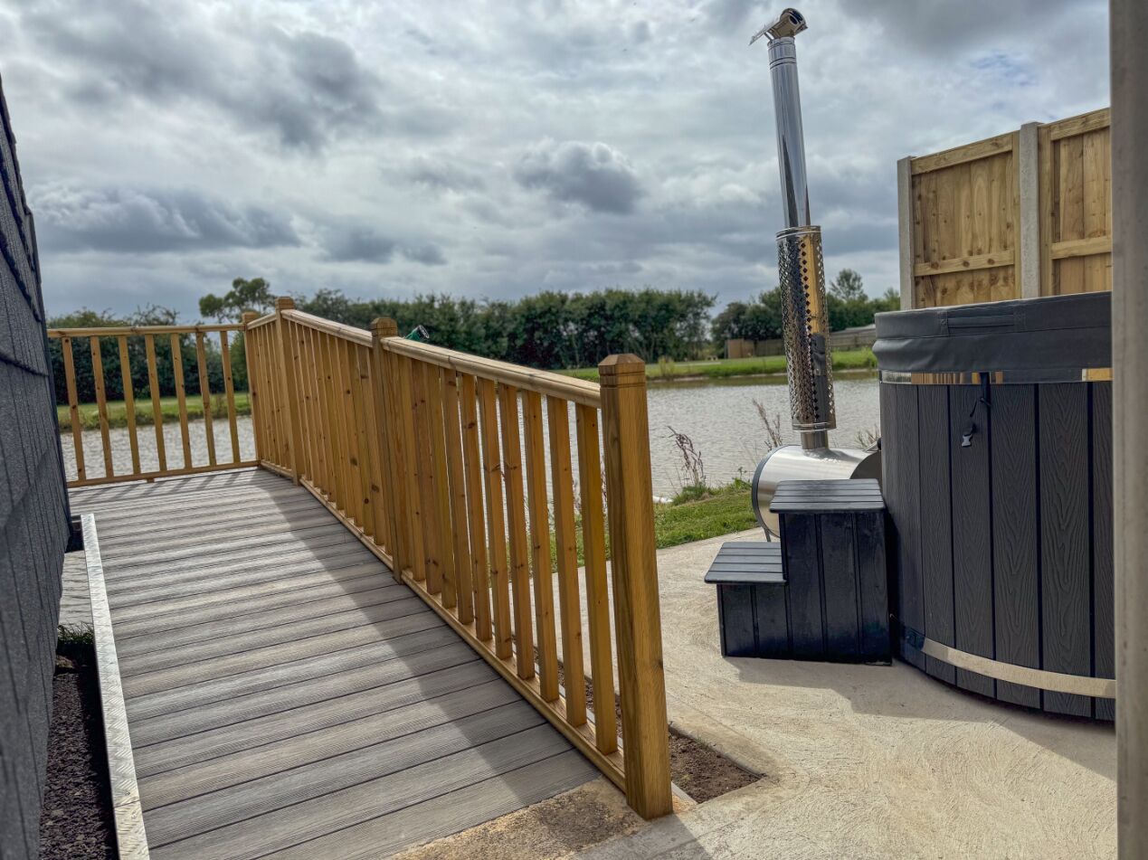 Cabin, Ensuite, Lake View | Outdoor spa tub