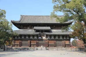 A traditional Japanese building with a multi-tiered roof and wooden construction. - 【Hoshizora inn】Machiya 1station from Kyoto Station (Kyoto)