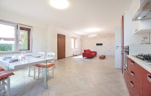 Fridge, stovetop, dishwasher, coffee/tea maker