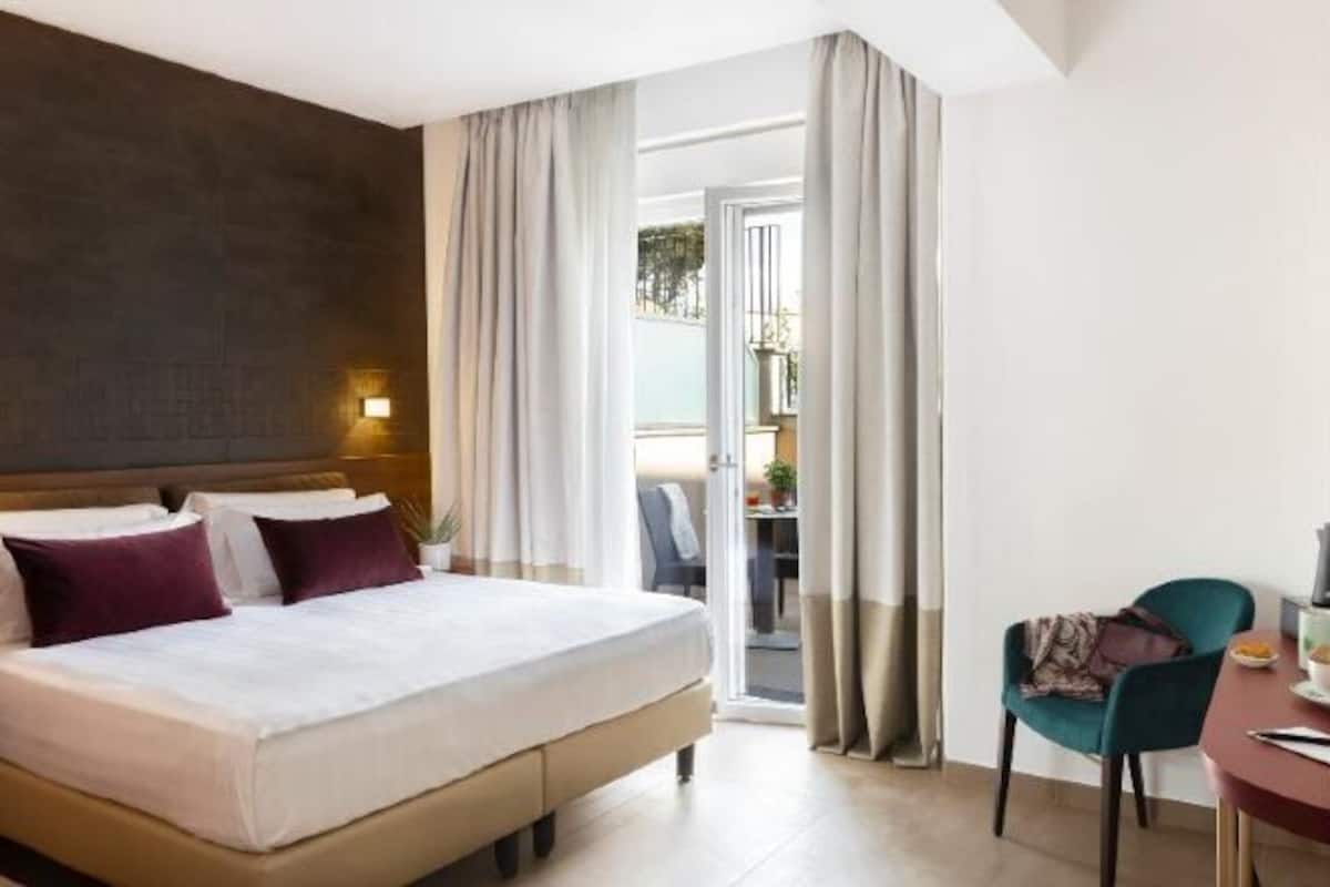 Premium bedding, down comforters, memory foam beds, in-room safe