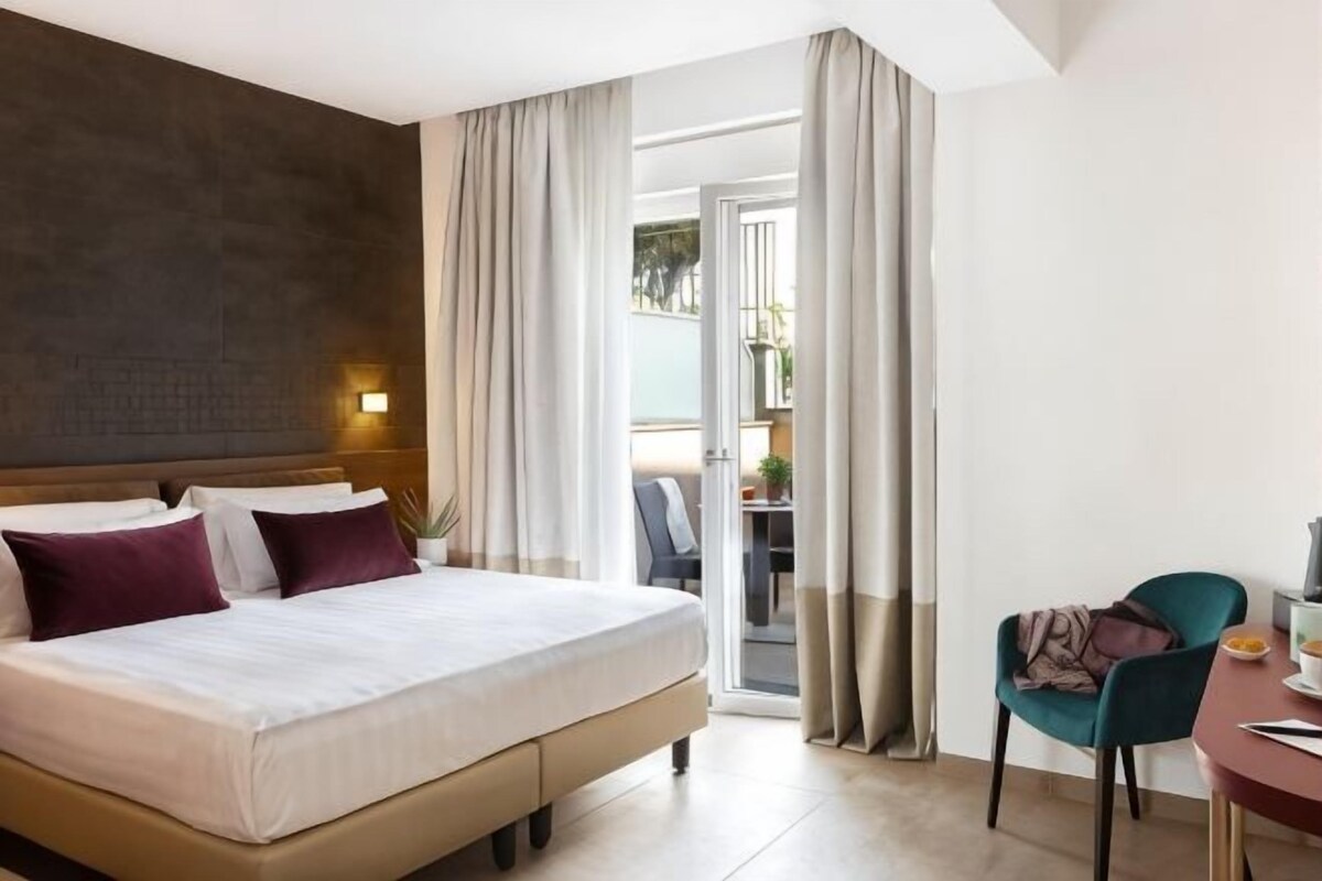Premium bedding, down comforters, memory foam beds, in-room safe