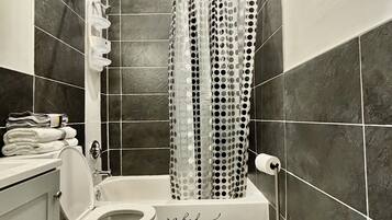Hair dryer, towels, soap, shampoo