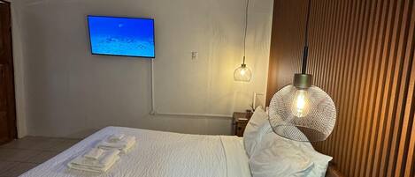 1 chambre, fer et planche à repasser, Wi-Fi, draps fournis