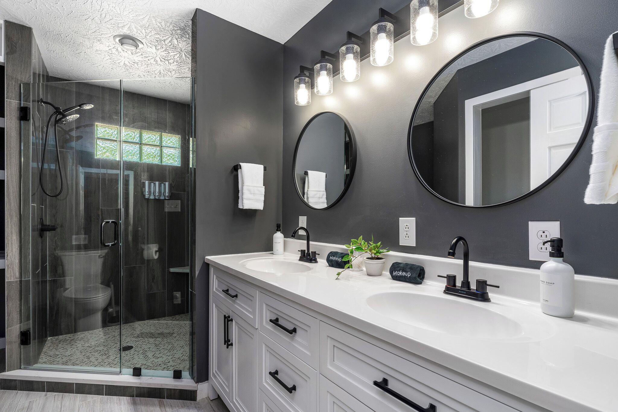Shower, hair dryer, towels, toilet paper