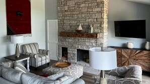 Living area - Sleeping Bear Beauty! Fully Remodeled Beachfront Condo with summer availability  (Glen Arbor)