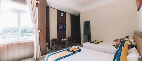 Chambre Deluxe | Minibar, décor unique, ameublement unique, bureau