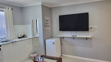 Fridge, microwave, electric kettle, toaster