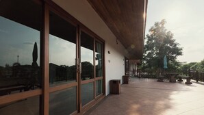 Deluxe Double Room, 1 King Bed, Non Smoking, Garden View | Terrace/patio - Thaihome Resort (Bang Kruai)