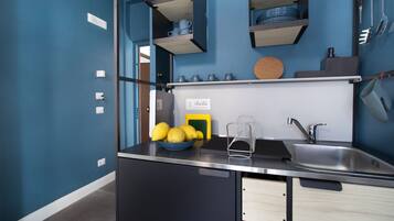 Fridge, stovetop, coffee/tea maker, toaster