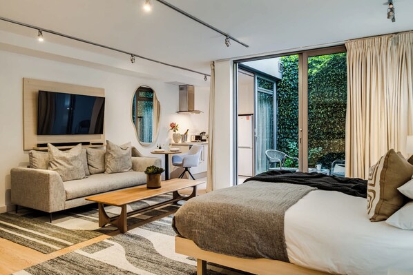 1 habitación, tabla de planchar con plancha, wifi y ropa de cama 