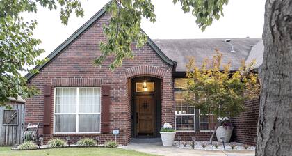 Spacious four-bedroom house in beautiful Broken Arrow. No cleaning fees!