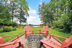 Property grounds - Cozy lake front cottage in Baldwin, MI with hot tub! (Baldwin)