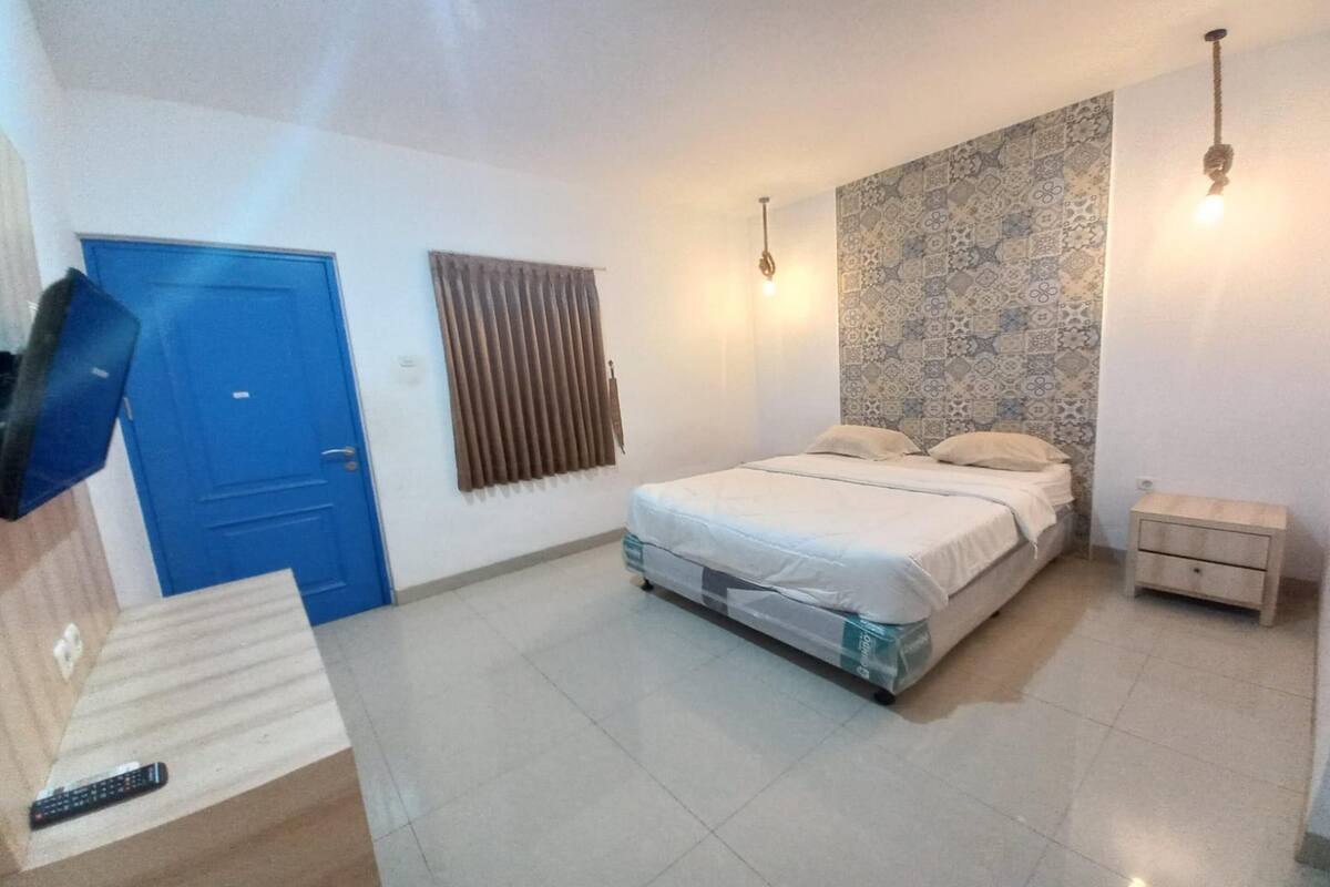Habitación Deluxe doble | Espacio para trabajar con un portátil, wifi gratis, ropa de cama