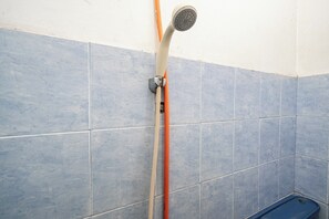 Habitación Deluxe doble | Baño | Ducha y toallas
