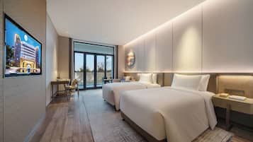 Deluxe Twin Room with Garden View | Premium bedding, down comforters, memory foam beds, minibar