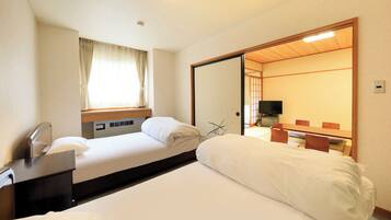 Habitación con 2 camas individuales, para no fumadores (Japanese/Western style, with shower) | Wifi gratis y ropa de cama