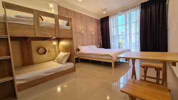 Suite estudio Deluxe, vista al jardín | Ropa de cama hipoalergénica y decoración personalizada