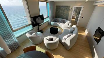 Luxury Apartment | Living area | 60-inch flat-screen TV with cable channels, pay movies