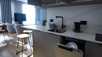 Luxury Apartment | Private kitchen | Full-sized fridge, microwave, oven, stovetop