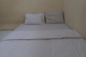 Espacio para trabajar con laptop, wifi gratis y ropa de cama 