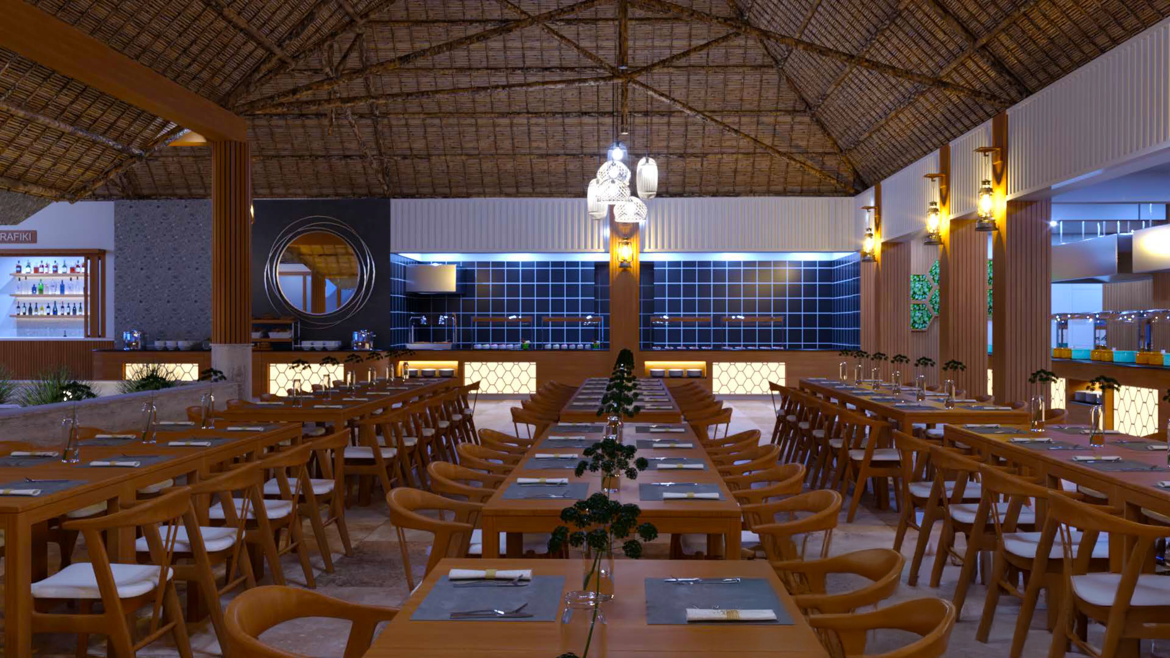 A restaurant with multiple dining tables and chairs, a bar area, and a large wall with a circular mirror and decorative lighting.