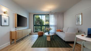 Apartment, 1 Queen-Bett und Schlafsofa | Wohnbereich | Fernseher