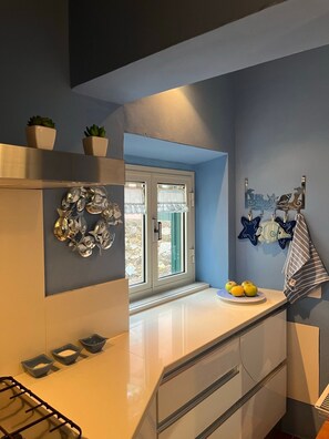 Private kitchen - Cozy and quiet apartment within walking distance from the sea (Porto Azzurro)