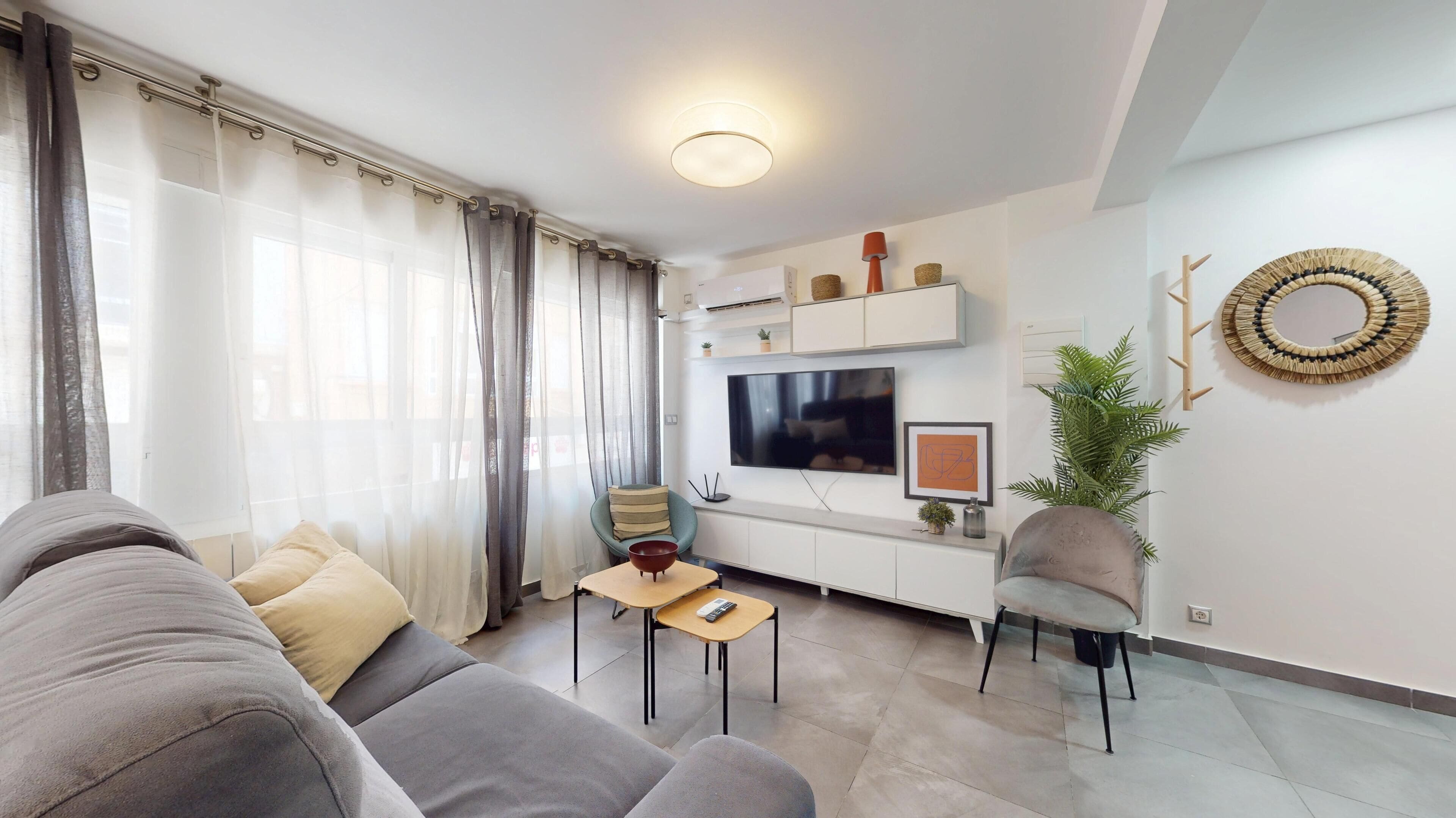 Leilighet – deluxe | Oppholdsområde | TV