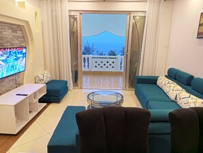 Comfort Apartment | Living area | 24-inch Smart TV with digital channels - Eden Beach Resort Apartments (Mombasa)