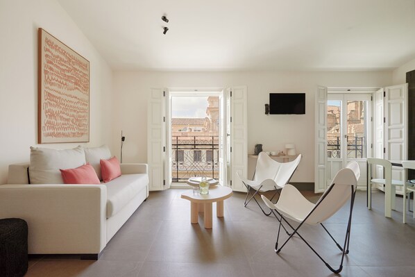 Premium Apartment, 2 Bedrooms | Living area | Flat-screen TV - U-Sense Granada Gran Vía (Granada)