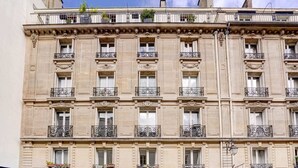 A multi-story building with classical architecture, featuring ornate balconies and large windows. - SaintGermain Sojourn - Charming 2 bedroom in the Rive Gauche (Paris)