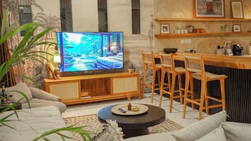 Comfort Villa, 3 Bedrooms, Pool View, Poolside | Living area | 52-inch Smart TV with digital channels