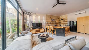 Comfort Villa, 3 Bedrooms, Pool View, Poolside | Living area | 52-inch Smart TV with digital channels