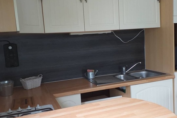 Fridge, microwave, coffee/tea maker, cookware/dishes/utensils