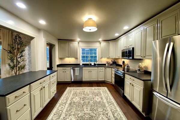 Spacious kitchen stocked with all the essentials.