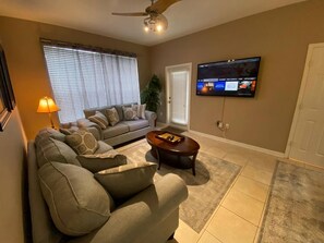 TV - Awesome condo just two miles from Walt Disney World with many amenities of it's own including water park, private cinema, playground and burger joint. Super Walmart just outside the gate to pick up those last minute items. Great family location! (Kissimmee)