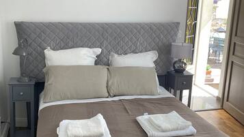 1 غرفة نوم ومكتب وواي فاي وملاءات أسرّة