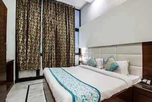 Quarto casal luxo, vista para a cidade | Wi-Fi de cortesia, roupa de cama