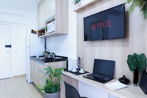 Apartamento | Área de estar | Smart TV