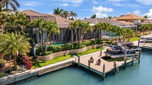 A heated pool - Luxury Home, Heated Pool & Spa on Canal, Walk to the Beautiful Sands of Tigertail Beach! (Marco Island)