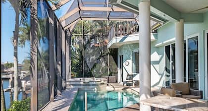 Luxury Home, Heated Pool & Spa on Canal, Walk to the Beautiful Sands of Tigertail Beach!