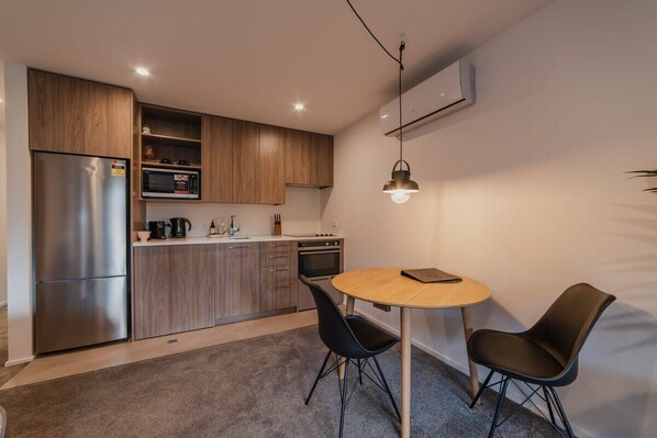 Coffee/tea maker, fridge, microwave, oven