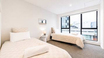 2 habitaciones, tabla de planchar con plancha, wifi y ropa de cama