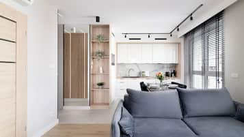 Luxury Apartment, 2 Bedrooms, Balcony, City View | Living room | 50-inch flat-screen TV with satellite channels