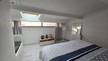 1 bedroom, desk, iron/ironing board, travel cot